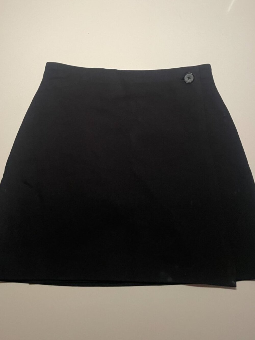 Babaton asymmetric mini skirt